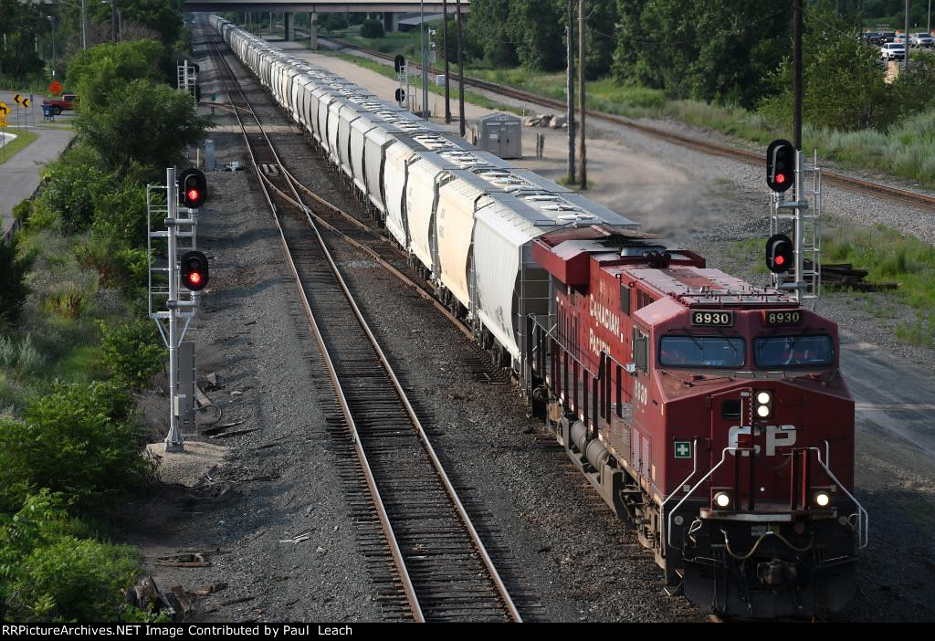 Grain train rolls east